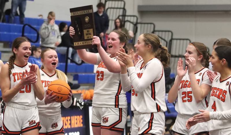 Crystal Lake Central’s Tigers celebrate a win over Burlington Central in IHSA Class 3A Regional Title Game girls basketball action on Thursday, Feb. 20, 2025, at  Central High School in Burlington.