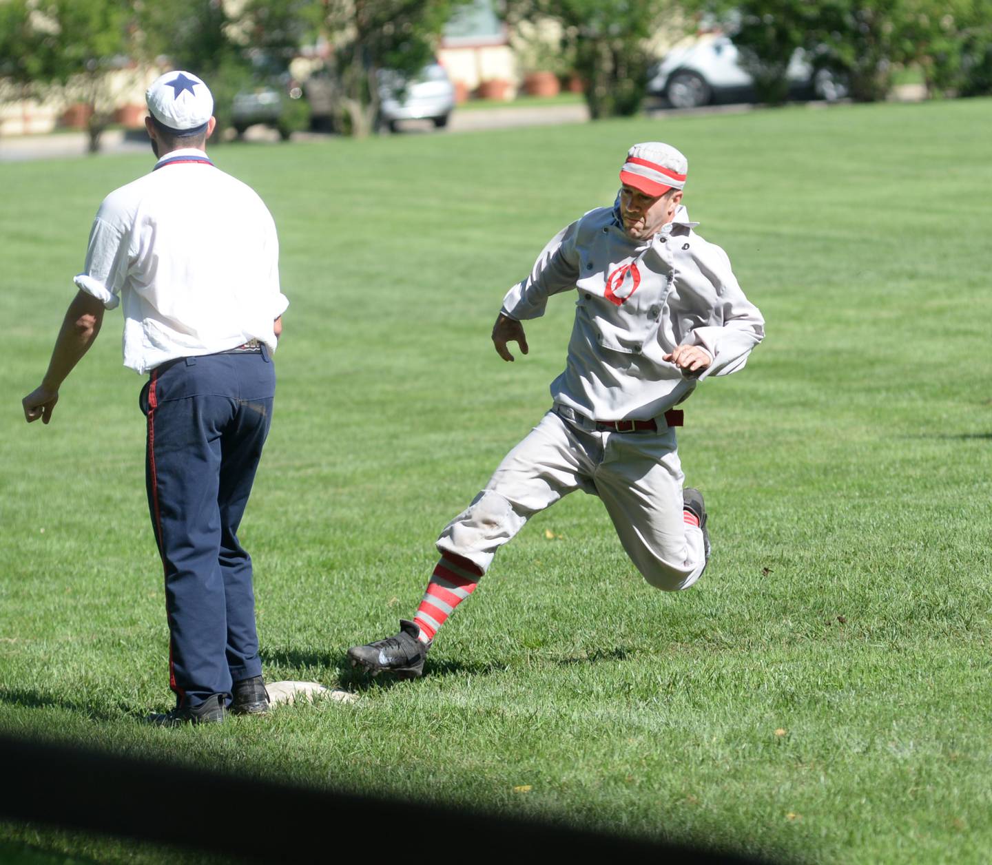 Eric "The Liberator" Berg rounds third base for the Oregon Ganymedes in their opening game at the 21st Annual World Tournament of Historic Base Ball in Dearborn, Michigan on Saturday, Aug. 10, 2024. The Ganymedes won the game and will play a second game at 3:30 p.m.