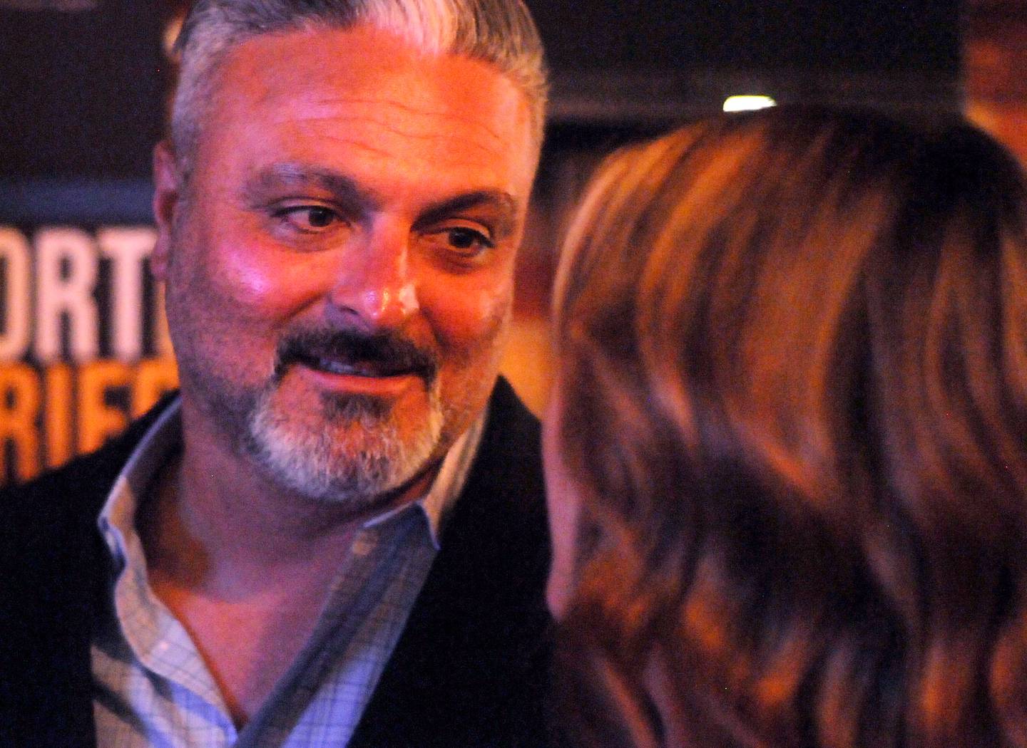 Tony Colatorti talks with his wife, Brittany, during his primary election night watch party Tuesday June 28, 2022, at Cucina Bella, 220 S. Main St. in Algonquin. Colatorti, who owns Cucina Bella, was one of two Republican candidates running to become McHenry County’s next sheriff.
