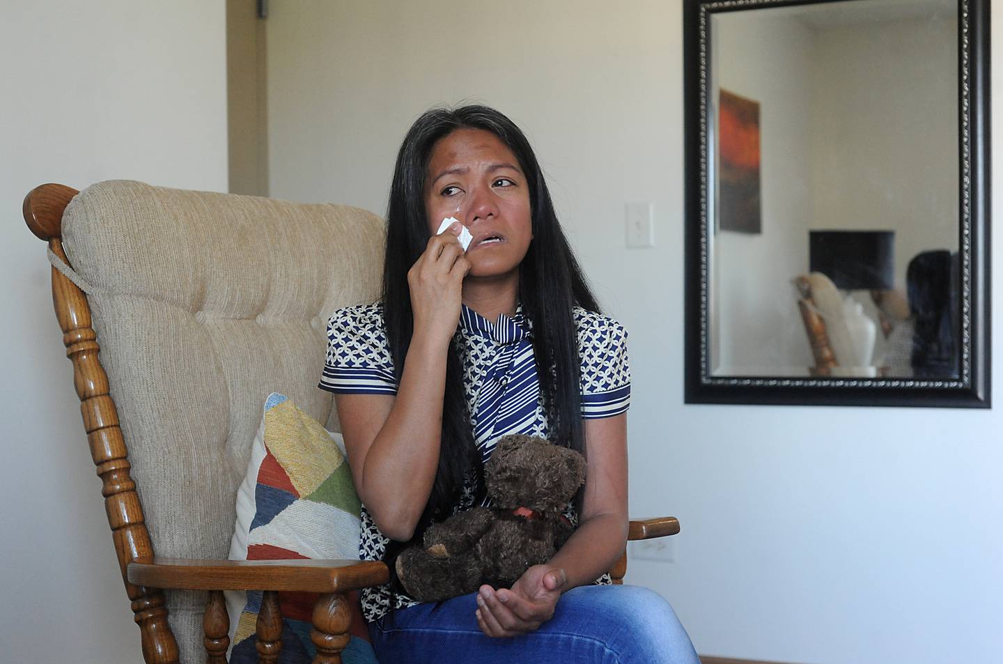 Wilma Alex wipes away tears Thursday, April 21, 2022,  at her apartment in McHenry County as she talks about being nearly killed in early March. Her husband, Mark Alex, was charged with attempted first-degree murder.