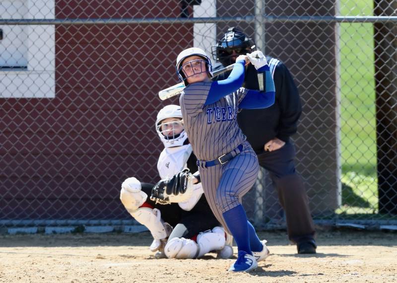 Princeton's Avah Oertel watches her home run ball take flight Saturday at Hall.