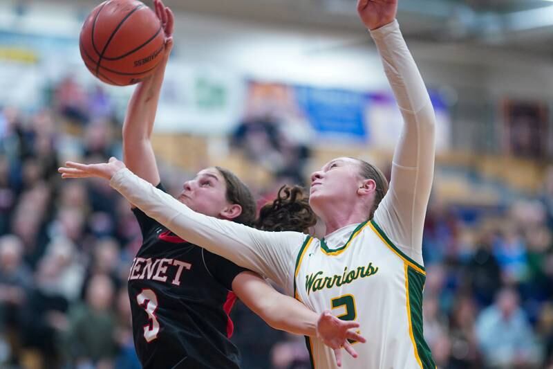 Benet’s Aria Mazza (3) rebounds the ball against Waubonsie Valley's Hannah Laub (2) during a Class 4A Oswego Sectional final basketball game at Oswego High School on Thursday, Feb 22, 2024.