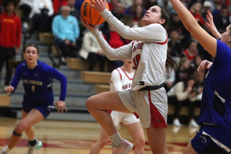 Huntley’s Alyssa Borzych shoots against Lake Zurich in IHSA Class 4A Sectional girls basketball action on Tuesday, Feb. 25, 2025, at Huntley High School in Huntley.