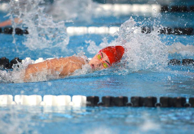 Hinsdale Central’s Burlingtyn Bokos competes in the 500-yard freestyle championship heat during the IHSA Girls State Swimming and Diving Championships at the FMC Natatorium in Westmont on Saturday, Nov. 11, 2023.