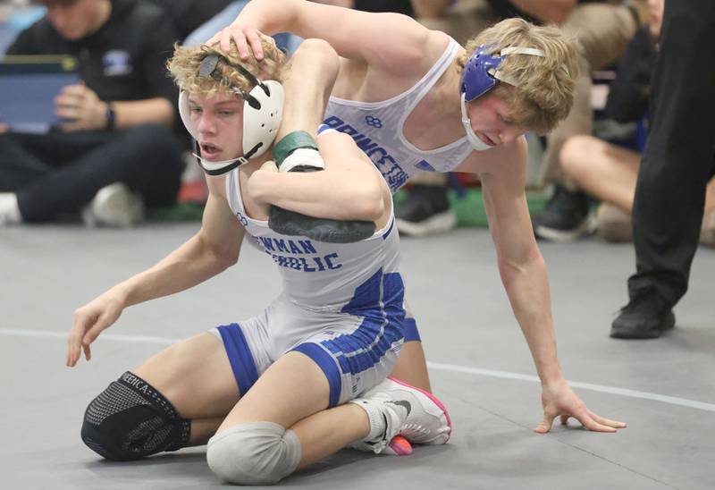 Princeton's Augustus Swanson wrestles Newman's Landon Near during the 62nd annual Lyle King Princeton Invitational boys tournament on Saturday, Jan. 10, 2026 at Princeton High School.