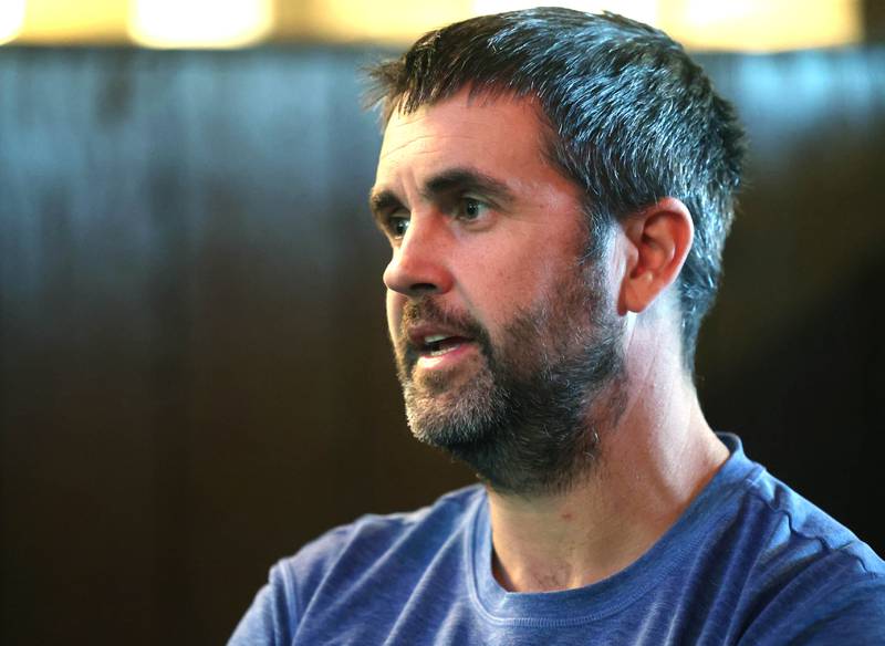 CJ Finn, co-owner of Pizza Villa, talks Monday, Jan. 26, 2026, at the restaurant about owning the business with his dad Joe on Lincoln Highway in DeKalb.