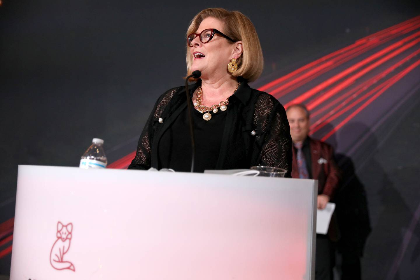 Karen McConnaughay accepts the L.E.A.P. Award during the 55th Annual Charlemagne Awards Dinner hosted by the St. Charles Chamber of Commerce at the Q Center in St. Charles on Friday, May 19, 2023.