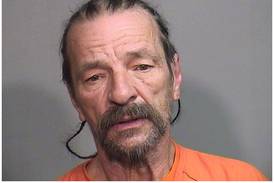 Woodstock man gets 15 years for switchblade; weed, gun, cocaine charges dropped  