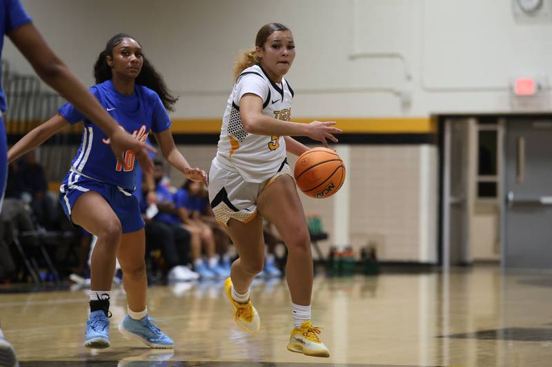 Joliet West’s Niyonna Reddington makes a move against Butler College Prep on Tuesday, Dec. 16, 2025 in Joliet.