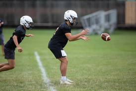 After a year away from football, Lane Robinson emerges as St. Charles East starting QB