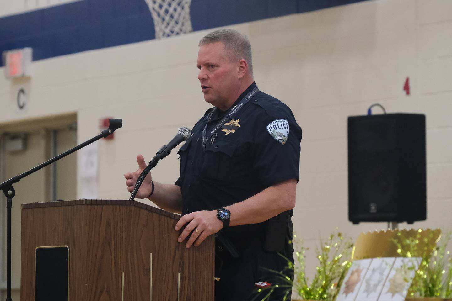 Plainfield Police Cheif John Konopek speaks at a Girls Scouts award ceremony. Thursday, May 12, 2022, in Plainfield.