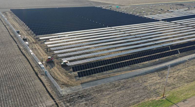 Crews build solar panels for Saliva Solar LLC near the intersection of County Road 1800 North and County Road 2100 East Street on Monday, March 30, 2026 north of Princeton. The solar farm will be a 5-megawatt commercial solar energy facility on 30 acres. When compleated, it will provide enough electricity to power 1,100 homes.