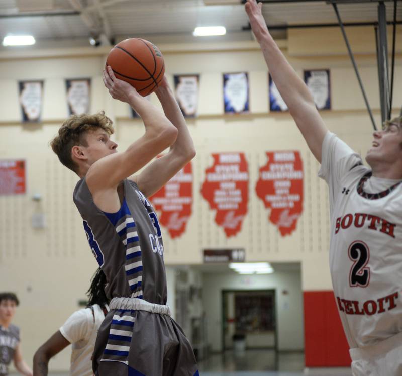 Sterling Newman's Lucas Simpson (23) shoots as South Beloit's Ross Robertson (2) tries to block during the championship game at the Oregon Thanksgiving Tournament on Saturday, Nov. 25, 2023 at the Blackhawk Center in Oregon.