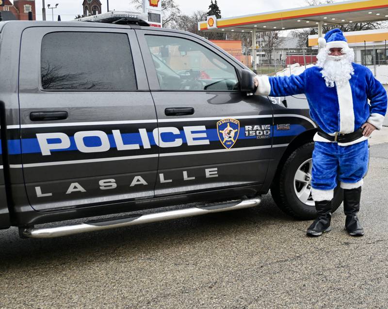 Over 150 children and 50 families received Christmas gifts through La Salle’s Officer Santa Program on Saturday.