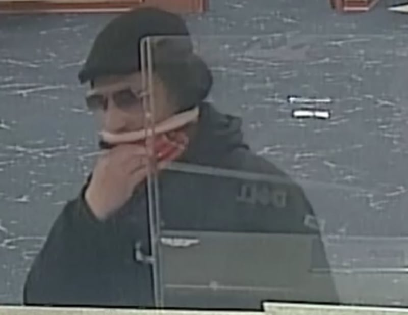 Surveillance footage showing who federal investigators say is Victor Barakat on Feb. 8, 2023, at Fifth Third Bank in Rolling Meadows. Barakat is charged with robbing the bank and attempted murder of a Joliet police sergeant who tried to apprehend him.