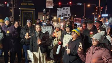 Photos: Vigil draws over 100 to downtown DeKalb for Minnesota woman killed by ICE agent