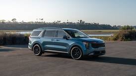 Carnival Hybrid SX is minivan with modern priorities