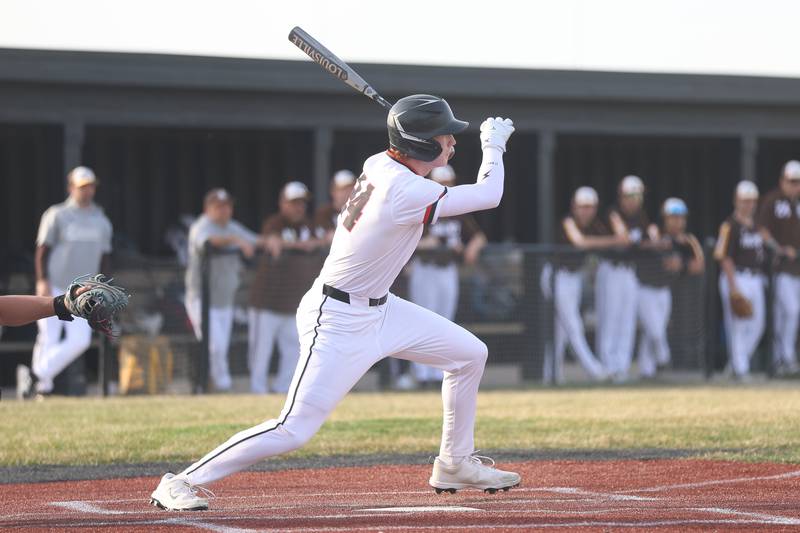 Lincoln-Way Central’s Conor McCabe drives in a run against Joliet Catholic on Wednesday, March 25, 2026 in New Lenox.