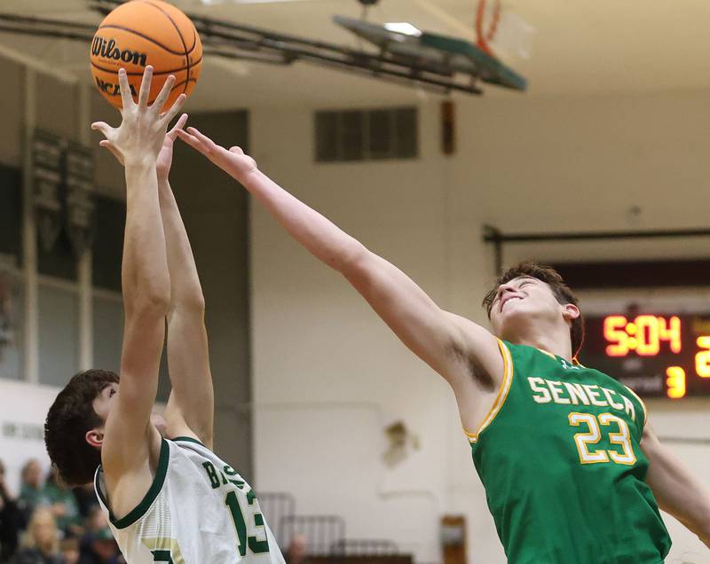 St. Bede's Graham Ross grabs a rebound over Seneca's Brady Sheedy on Tuesday, Dec. 16, 2025 at St. Bede Academy.