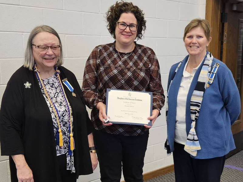 (Left to right); DAR General John Stark Chapter Regent Donna Willrett, Tauyna Eckman, and chapter member Deb Davey