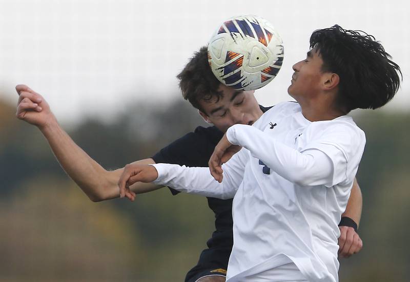 Richmond-Burton's Dane Gardner tries to head the ball into the goal as F.W. Parker's Jayden Flores defends during an IHSA Class 1A Johnsburg Sectional semifinal match on Oct. 28, 2025, at Johnsburg High School.