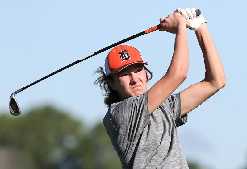 DeKalb's TJ Fontana watches his tee shot Tuesday, Aug. 9, 2022, during golf practice at River Heights Golf Course in DeKalb.