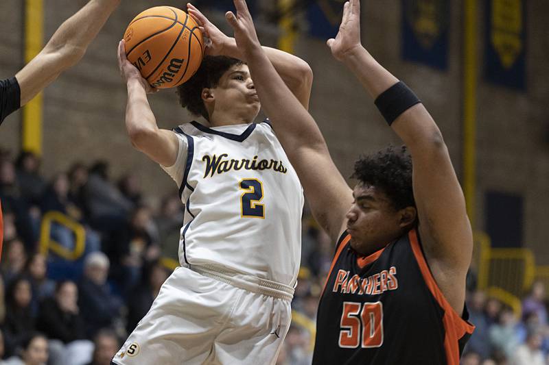 Sterling’s Deandre Maas goes to the hoop against UT’s Octavius Hickman Friday, Jan. 16, 2026.