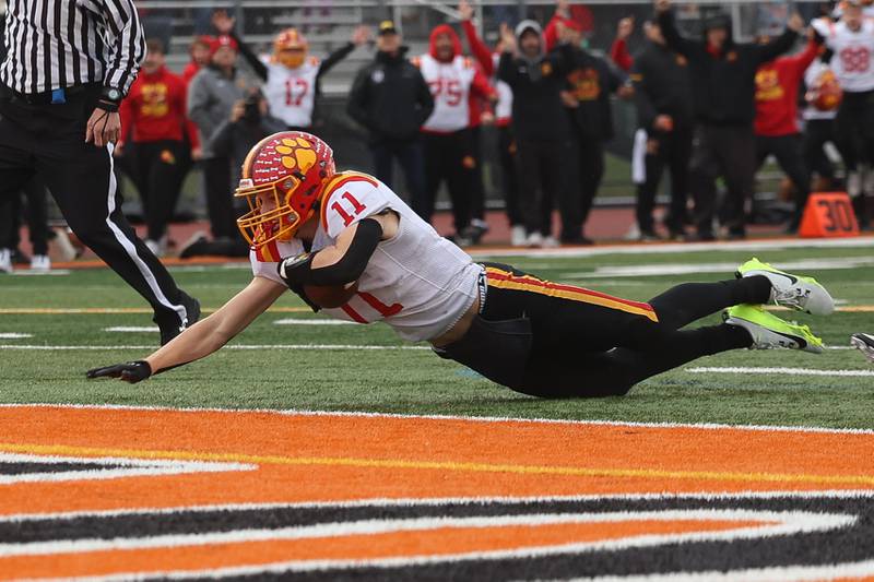 Batavia’s Brett Berggren leaps into the end zone for the go-ahead score against Lincoln-Way West on Saturday, Nov. 9, 2024 in New Lenox.