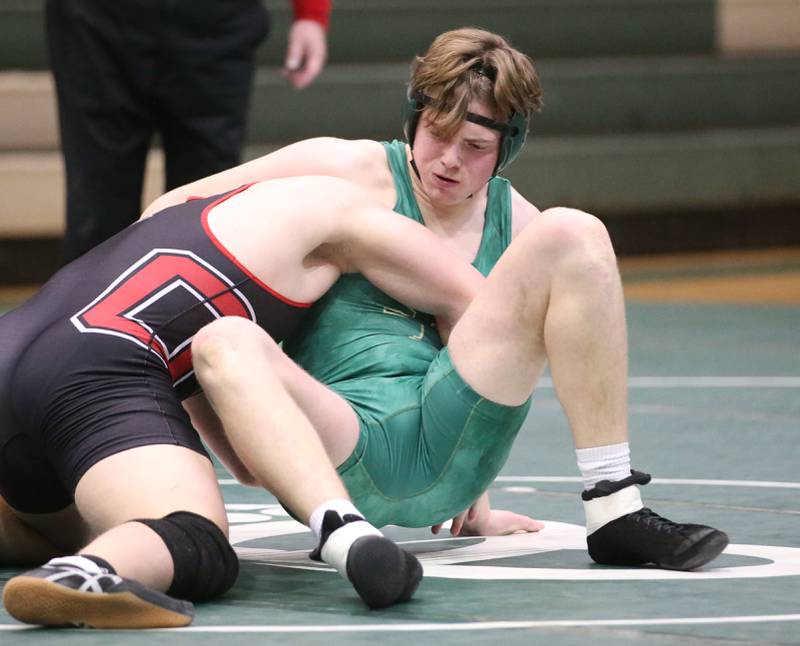 St. Bede's Jake Miglorini wrestles Orion's Aiden Fisher during a triangular meet on Wednesday, Jan. 18, 2023 at St. Bede Academy.