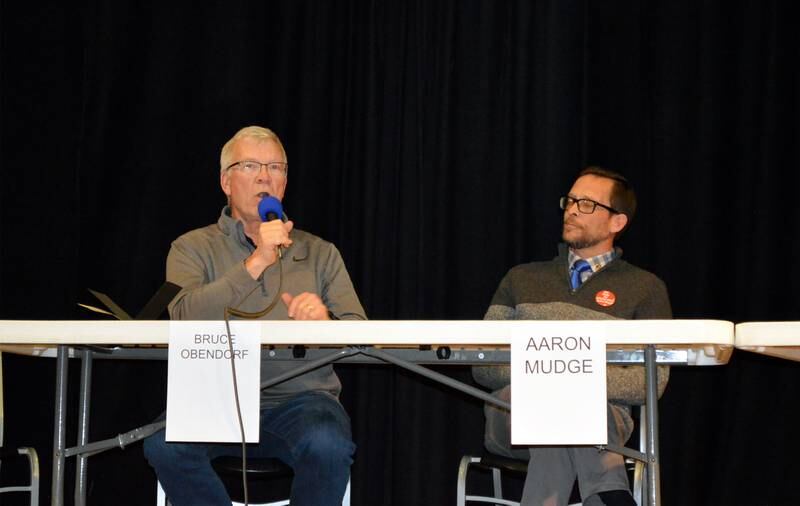 Oregon School District Board of Education candidate Bruce Obendorf, left, of Mt. Morris, talks during the March 23, 2023, Candidates Night hosted by the Mt. Morris Economic Development Group. Fellow candidate Aaron Mudge, of Oregon, right, listens. All candidates running for the Oregon School District Board of Education and for the Mt. Morris Village Board were invited to the forum held at Pinecrest Grove.