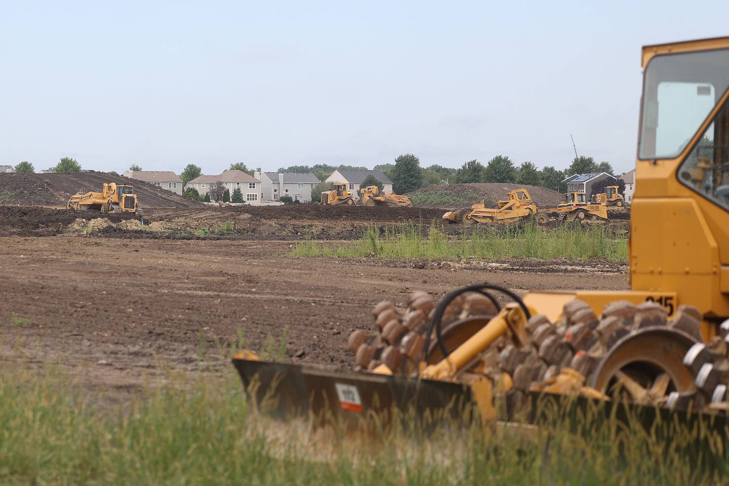 Crews work on clearing the Keller Farm field for the development of residential neighborhood on Wednesday, July 31, 2024 in Plainfield.