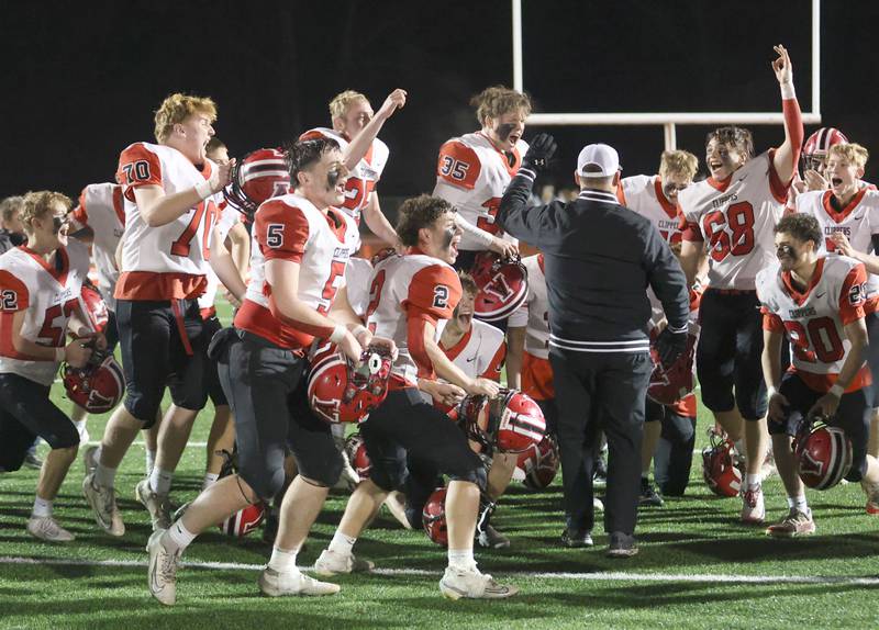 Members of the Amboy/LaMoille/Ohio football team react after winning the 8-man I8FA championship against Polo on Friday, Nov. 21, 2025 at April Zorn Memorial Stadium in Monmouth.