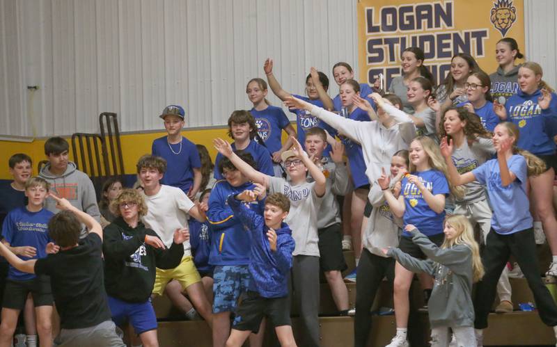 Logan student section students cheer on the lady lions volleball team while playing Rockford-Marshall during the IESA Class 3A eighth-grade Regional final game on Thursday, March 13, 2025 at Logan Junior High School in Princeton.
