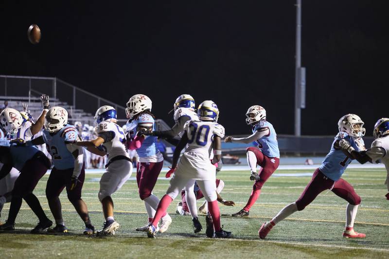 Kankakee's Elijah Cunningham kicks an extra point during the Kay's victory over Bloom on Friday, Oct. 10, 2025.