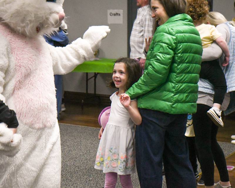Orla Ryan, 5, of La Grange is all smiles as she waves to the Easter bunny on Saturday March 29, 2025, during the breakfast with the bunny event held at the La Grange Park District Recreation Center.