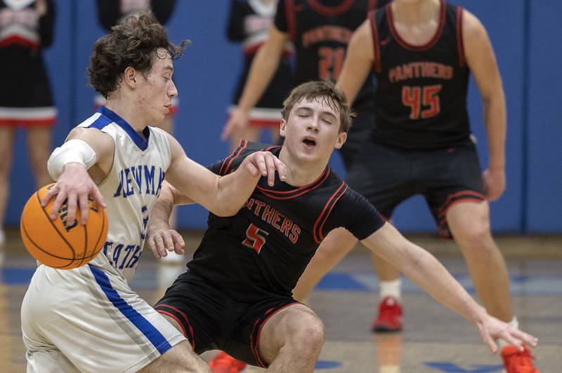 Newman’s Garret Matznick works against Erie-Prophetstown’s Max Milem Wednesday, Jan. 29, 2025, at Newman High School.