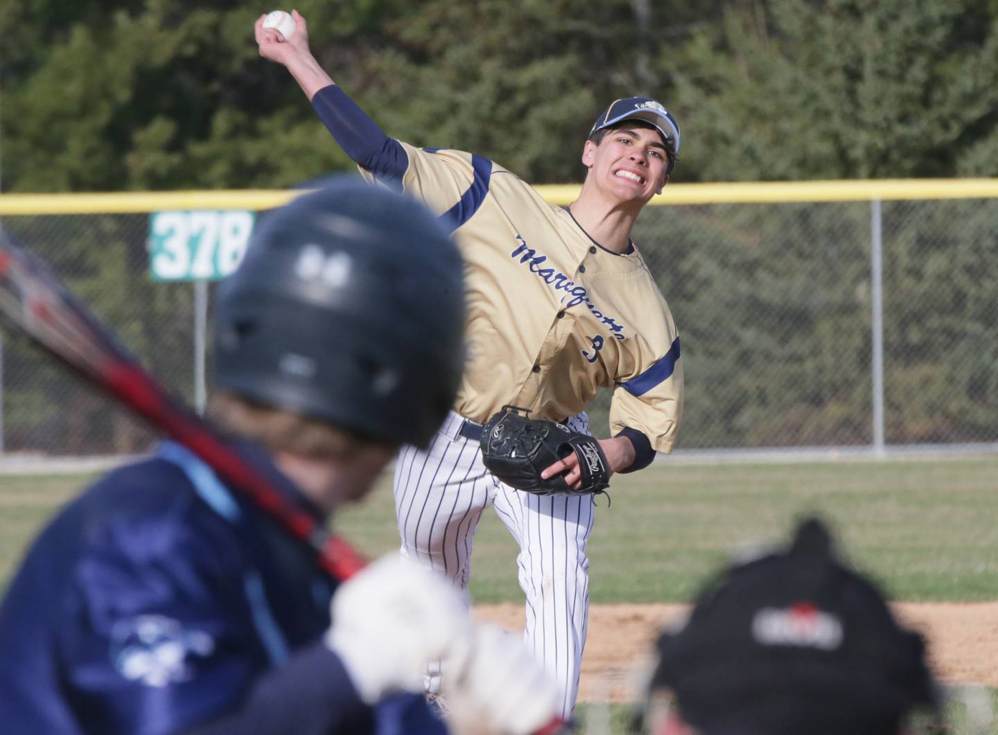 Marquette's Taylor Waldron (3) delivers a pitch to Prairie Central on Monday, March 28, 2022, at Masinelli Field in Ottawa.