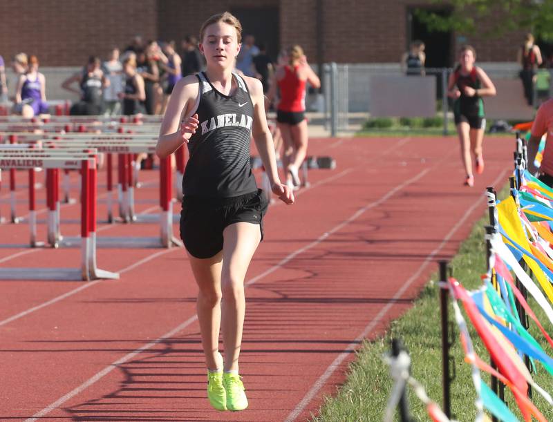 Kaneland's Danielle Bower wins the 3200 meter run during the Interstate 8 conference track meet on Friday, May 3, 2024 at the L-P Athletic Complex in La Salle.