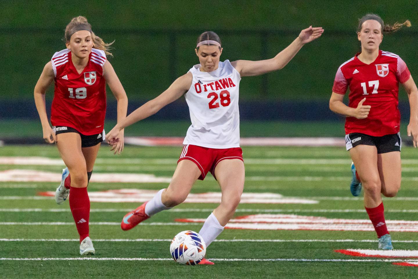 Ayla Covalsky (28) of Ottawa controls ball on Tuesday, May 21, 2025 at Malone Field in Metamora.