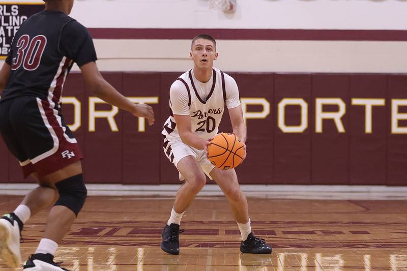 Lockport’s Anthony Kosi posts up for the deep shot against Plainfield North on Friday, Jan. 3, 2025 in Lockport