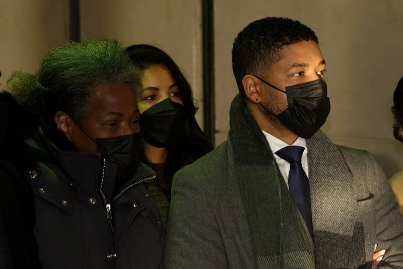 Actor Jussie Smollett, right, departs the Leighton Criminal Courthouse Wednesday, Dec. 8, 2021, with his mother, Janet, after Cook County Judge James Linn gave the case to the jury in Chicago. (AP Photo/Charles Rex Arbogast)