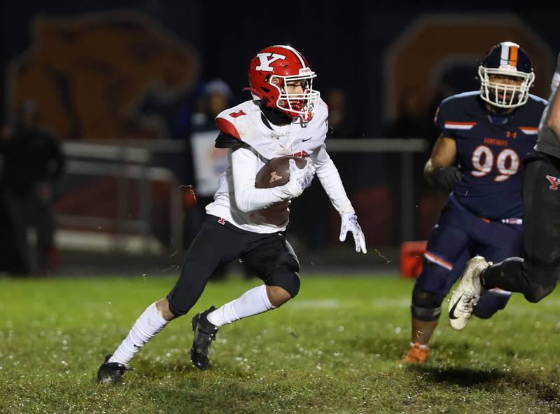 Yorkville’s Dom Coronado (1) runs the ball during the boys varsity football game against Oswego on Friday, Oct. 6, 2023 in Oswego.