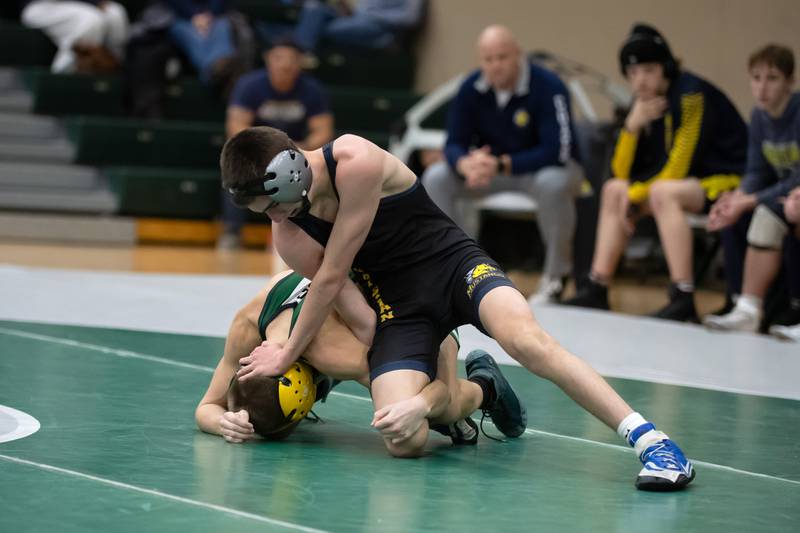 Yorkville's Davin Torza, top, and Coal City's Jake Munsterman wrestle in the 106-pound match during the IHSA Class 1A Coal City Dual Team Sectional on Thursday, Feb. 5, 2026.