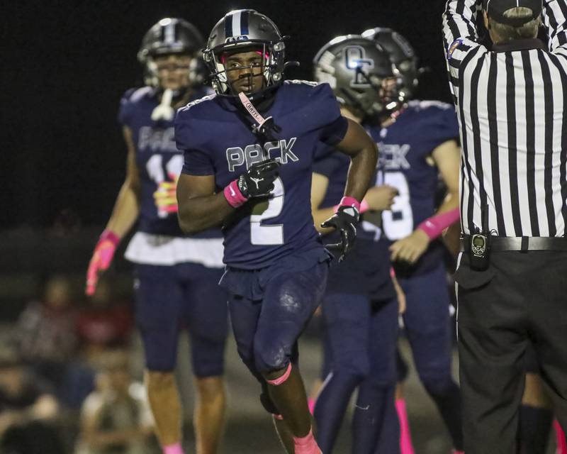 Oswego East's Jasiah Watson (2) runs off the field after scoring a touchdown during football game between Yorkville at Oswego East Friday, Oct 10, 2025 in Oswego.