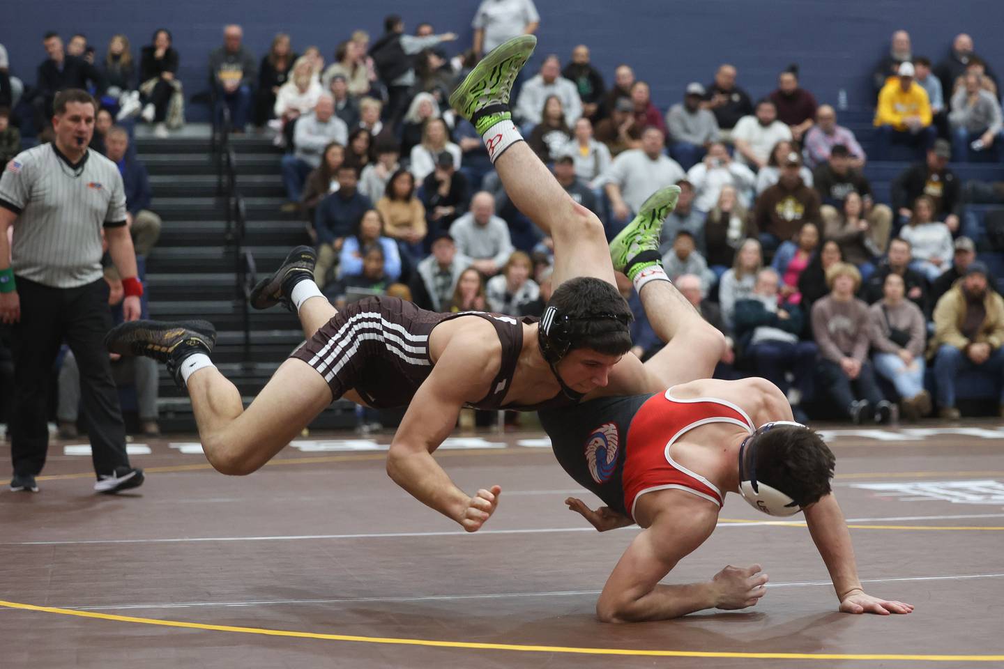 Joliet Catholic’s Maxwell Corral throws down Marian Central’s Max Astacio for two points in the tri-meet at Joliet Catholic on Thursday, Jan. 18th, 2024 in Joliet.