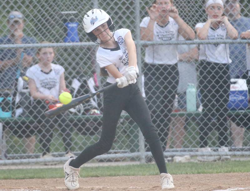 Spring Valley's Callie Fusinetti gets a hit against Tri-Cities on Tuesday, July 25, 2023 at McKinley Park in Peru.