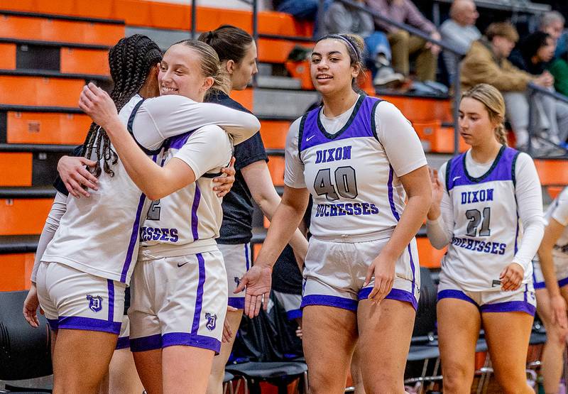 Makenzie Toms and Ahmyrie McGowan (left) celebrate during the fourth quarter of the Class 3A Freeport Regional championship game against Rockford Boylan on Thursday, February 20, 2025.