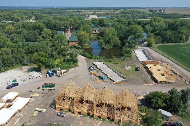 A crew builds new cabin units on Monday, Aug. 28, 2023 at Grand Bear Resort at Starved Rock in Utica. A massive fire destroyed 28 units on Memorial Day Weekend in 2022.