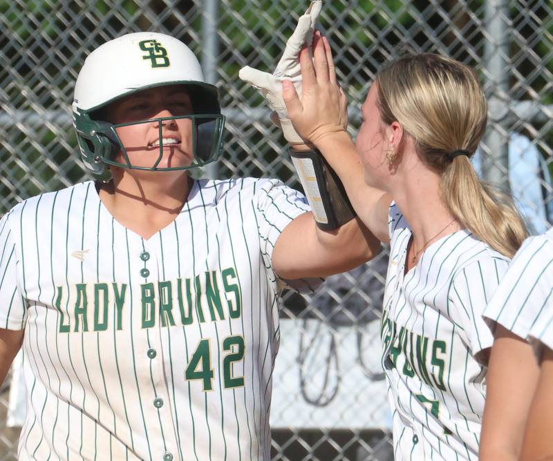 St. Bede's Ava Balestri hi-fives teammate Leah Griggs after hitting a home run against Dwight on Friday, May 15, 2026 at St. Bede Academy.