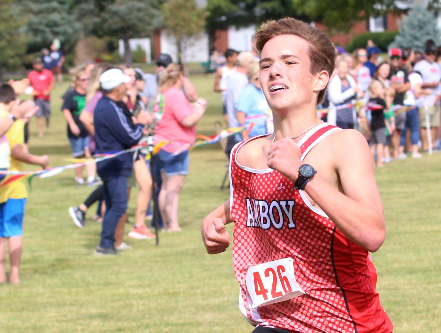 Amboy's Henry Nichols finishes first place in the boys varsity race during the Gary Coates Invitational cross country meet on Saturday, Sept. 13, 2025 at Zearing Park in Princeton .